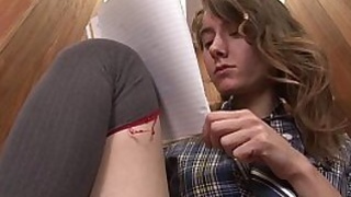 Girl inserts pens into her hairy cunt