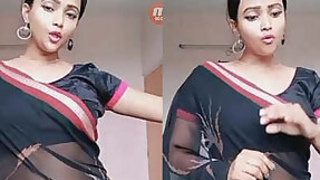 Sexy hot girl deep round belly button in saree