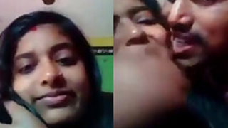 Seductive Indian student looks into the camera with partner filming porn