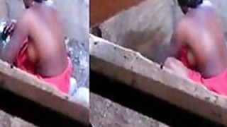 Cunning boy sneakily films how Desi woman washes XXX jugs outdoors