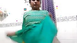 Unsatisfied bhabhi with a brinjal in the bathtub