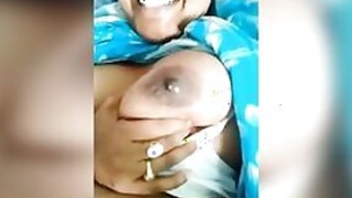 Desi's milk boobs exposed in close-up in a homemade video