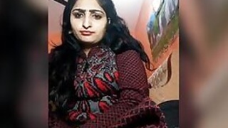 Hot Desi female shows off her big XXX melons from under her dress