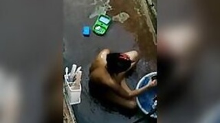 Desi nude bathing outdoors, secretly recorded by neighbor