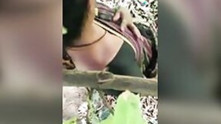 Desi Bhabhi with a promiscuous soul fucks outdoors with her own nephew doggy-style