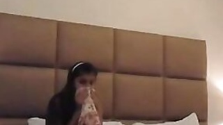 Desi in warming clothes has sex for the first time on camera with her boyfriend in a hotel room