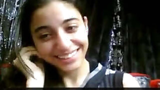 Adorable girl enjoying the spotlight in a hot video