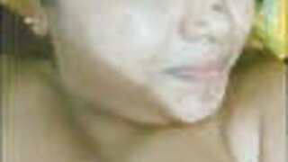 Hot desi bhabhi presses her big tits
