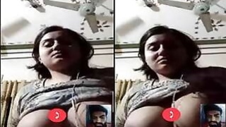 Sexy girl with big tits on a video call